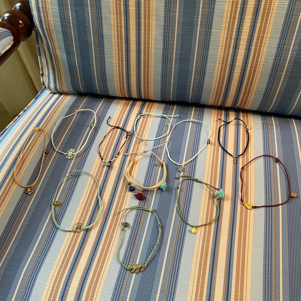 11 PuraVida bracelets with charms